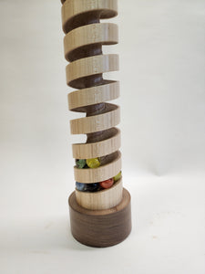 The "Long Way Around" Spiral is handmade desktop marble wood toy made from Maple.