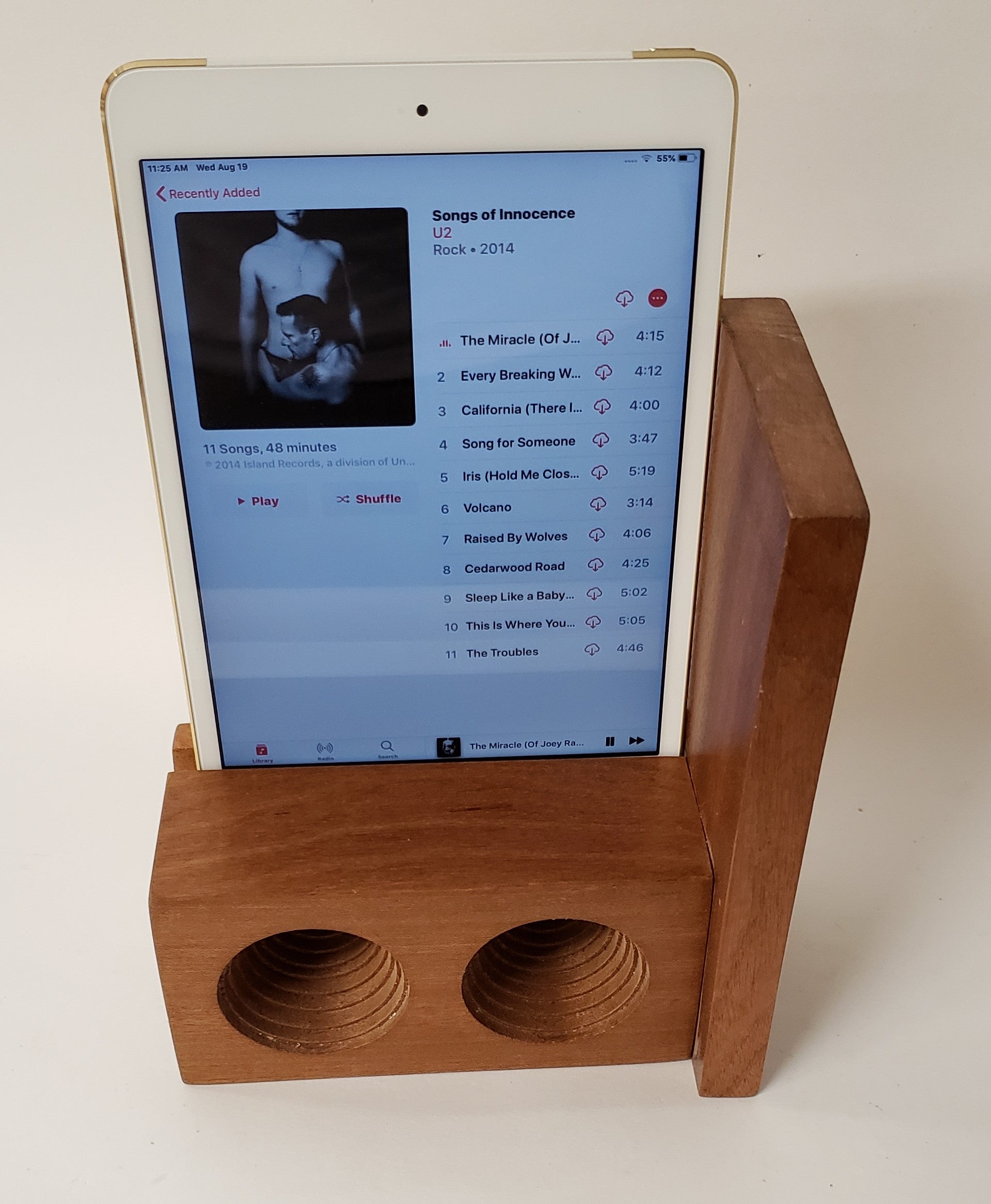 The AMP Mini a hand made wooden passive speaker. fits an IPad Mini