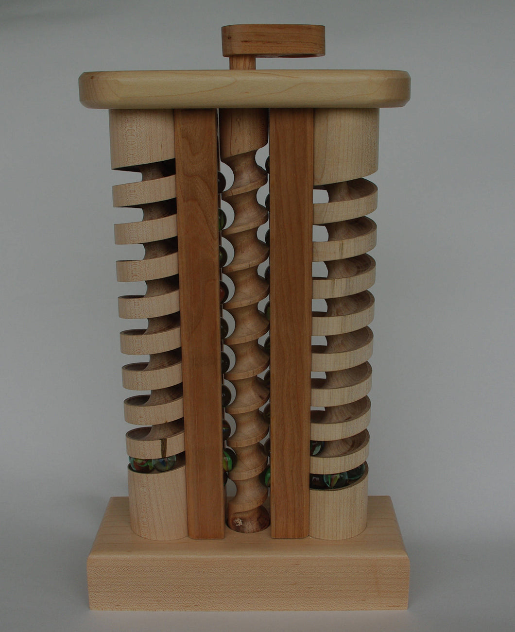The Mother-in-Law is a wooden toy with marbles made by hand in Vermont.